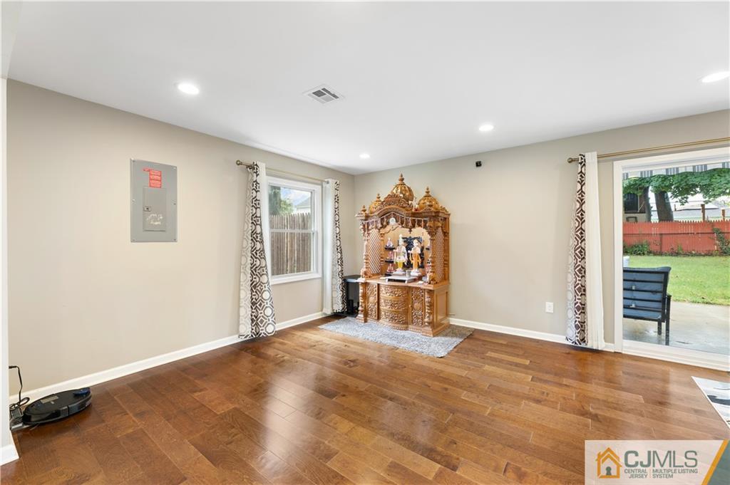 18 Baxter Road Edison, NJ 08817 - Photo 11 of 32 a view of a livingroom with furniture and a window