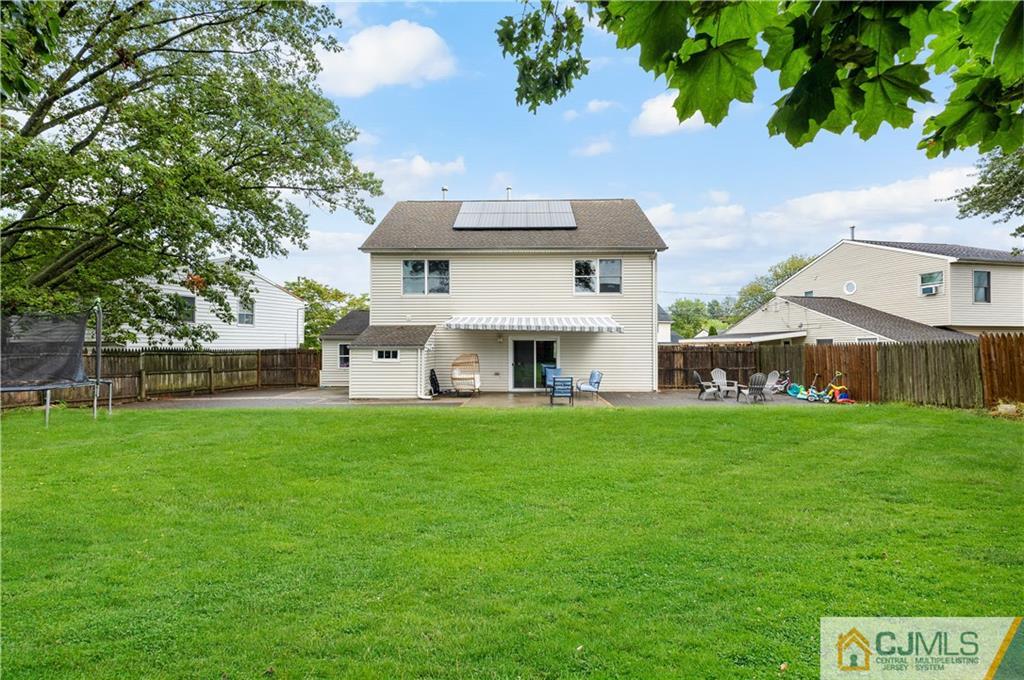 18 Baxter Road Edison, NJ 08817 - Photo 6 of 32 a view of a house with a garden