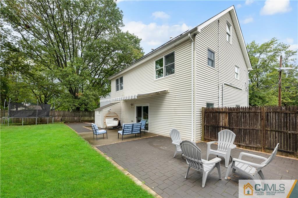18 Baxter Road Edison, NJ 08817 - Photo 7 of 32 a view of a patio with a yard