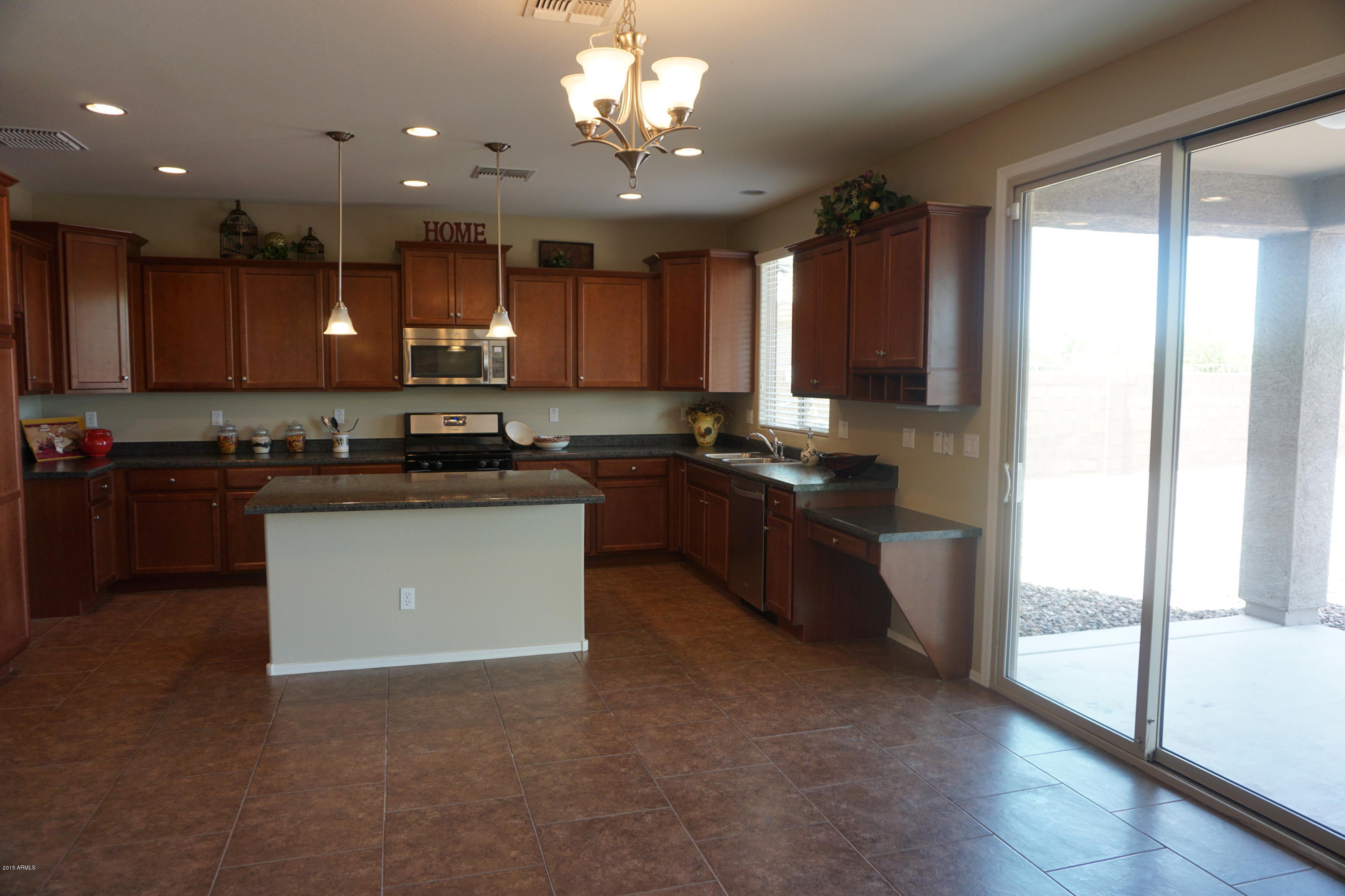 6814 West Harwell Road Laveen, AZ 85339 - Photo 4 of 23 Kitchen with Patio Access