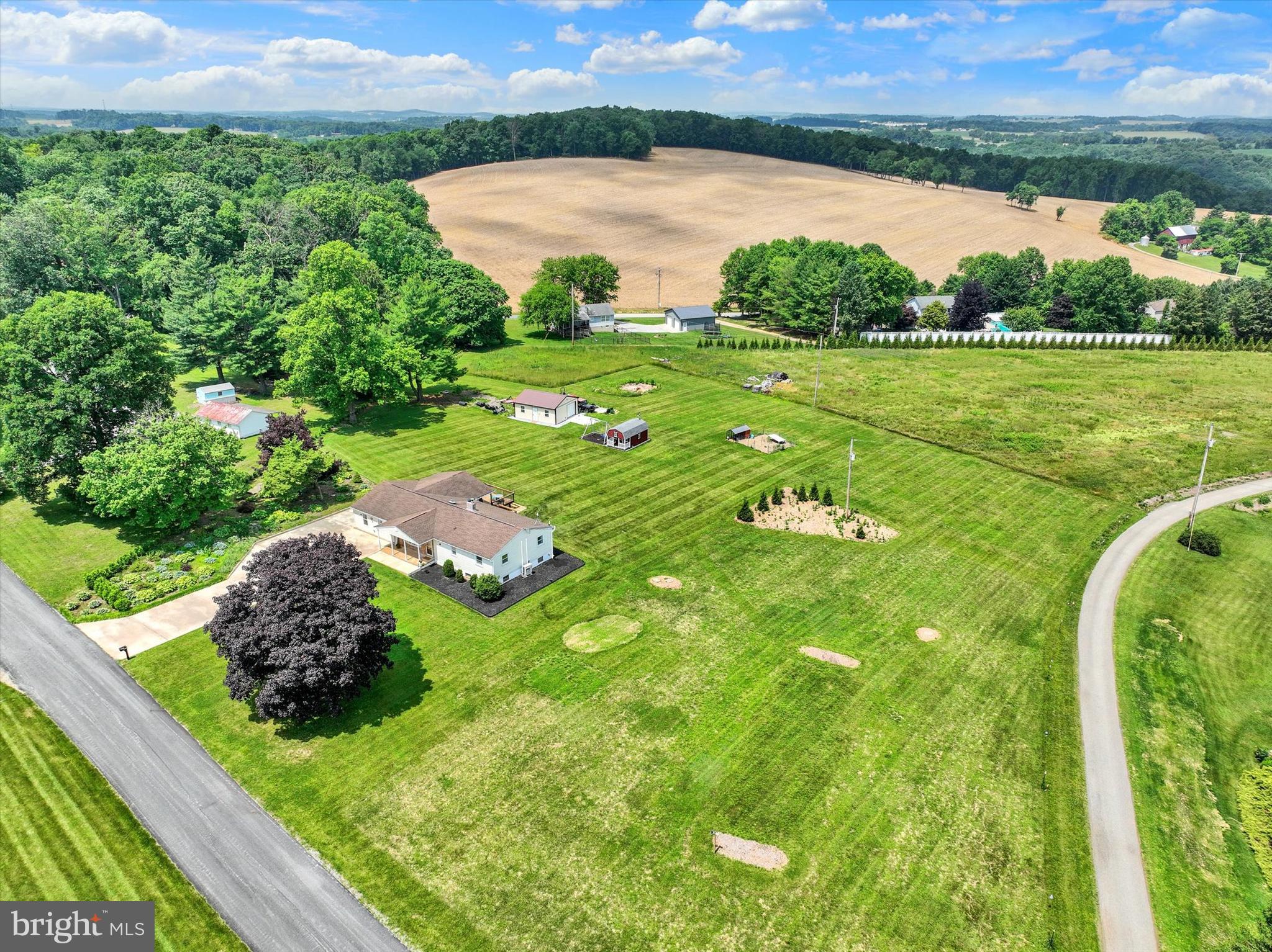 13174 Mont Road Felton, PA 17322 - Photo 15 of 39 a view of a garden with a lake