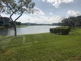 1022 Newcastle B, Unit 1022 Boca Raton, FL 33434 - Photo 1 of 19 lake - rear view