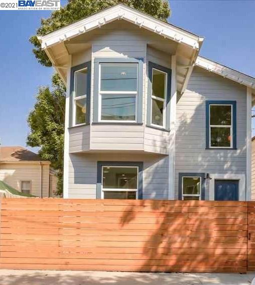 a front view of a house with glass windows