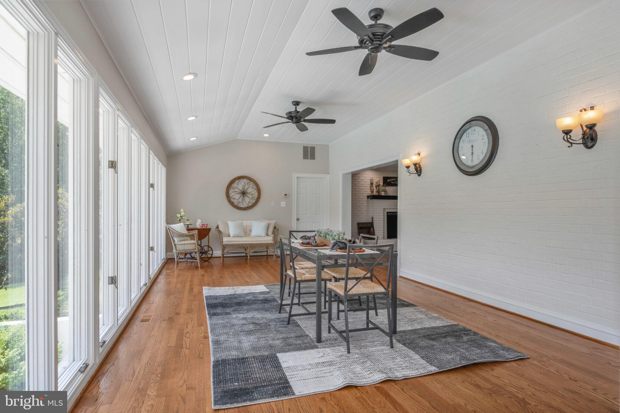 13111 Springdale Estates Road Clifton, VA 20124 - Photo 28 of 109 Sunlit with vaulted ceilings and a wall of windows