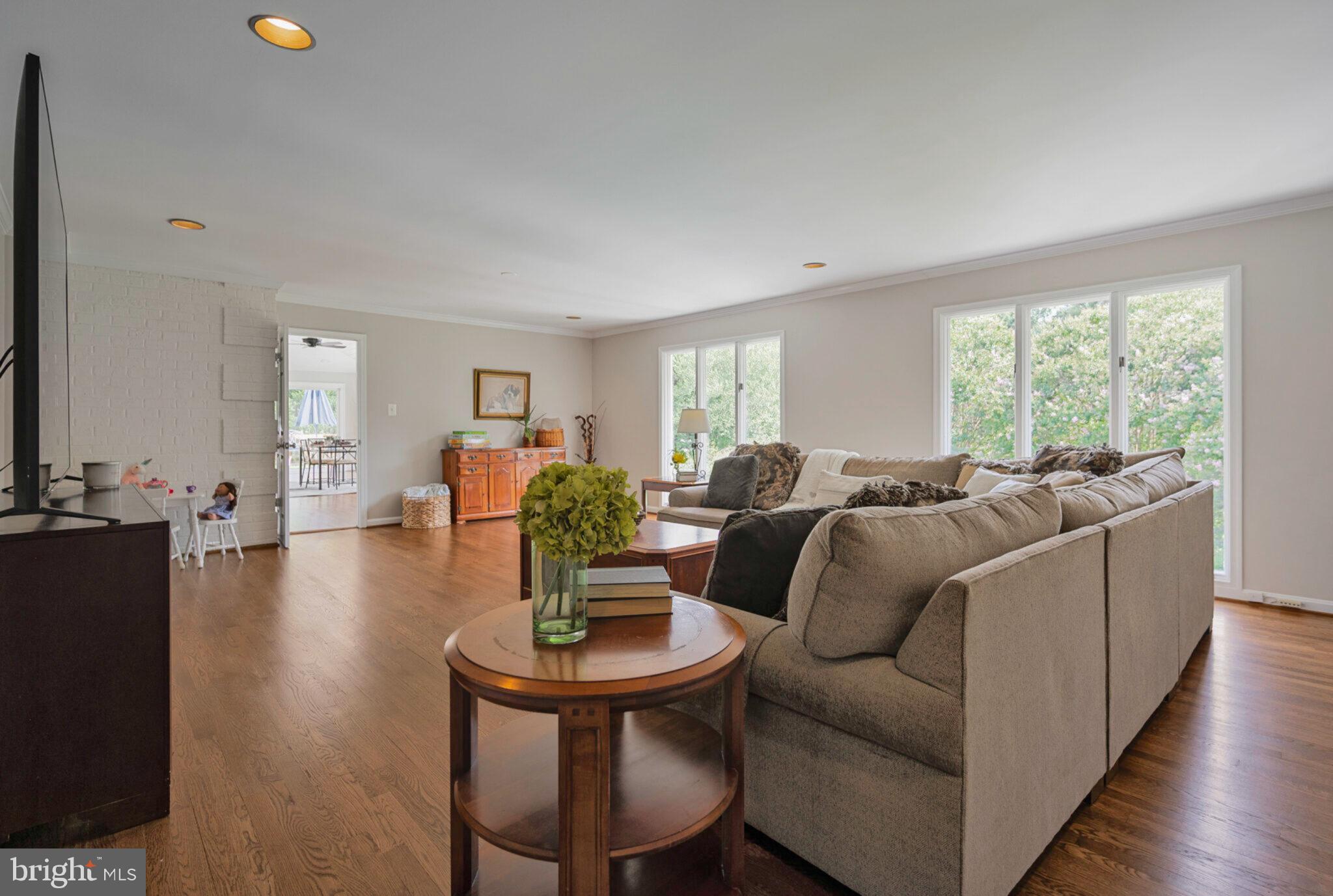 13111 Springdale Estates Road Clifton, VA 20124 - Photo 33 of 109 The wall of window continues from the sunroom