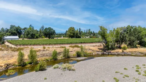 a view of a lake with a big yard