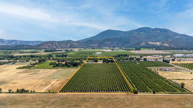 a view of a swimming pool with a lake view