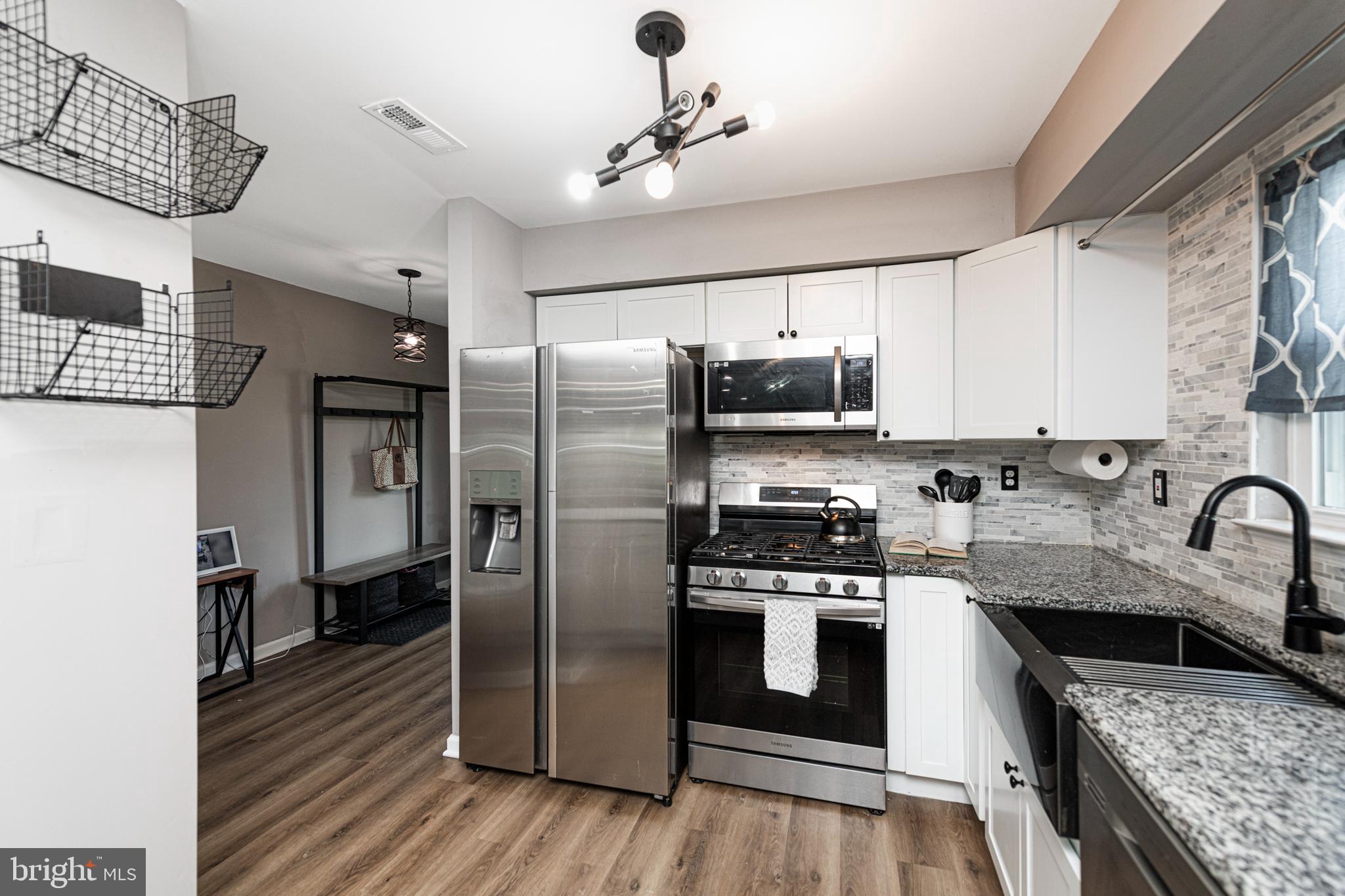 527 May Street Pottstown, PA 19464 - Photo 11 of 43 Updated Kitchen Shaker Cabinets & Granite Counter