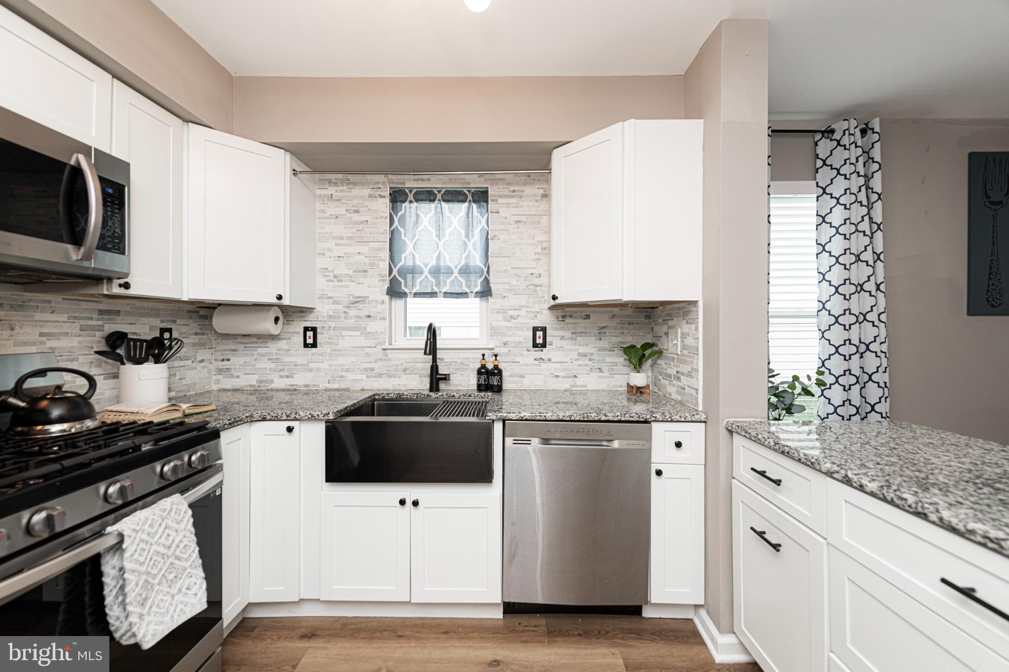 527 May Street Pottstown, PA 19464 - Photo 12 of 43 Updated Kitchen Shaker Cabinets & Granite Counter