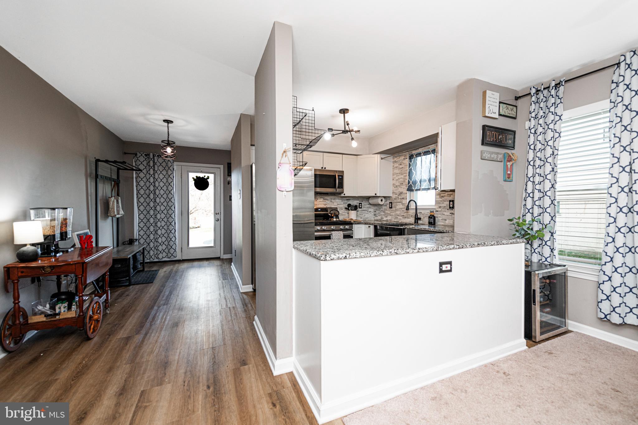 527 May Street Pottstown, PA 19464 - Photo 9 of 43 Back Door Mudroom Area & Kitchen