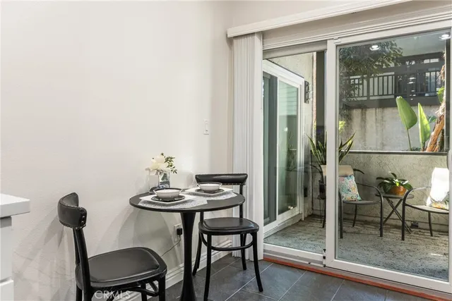 a kitchen with a sink a stove and a microwave
