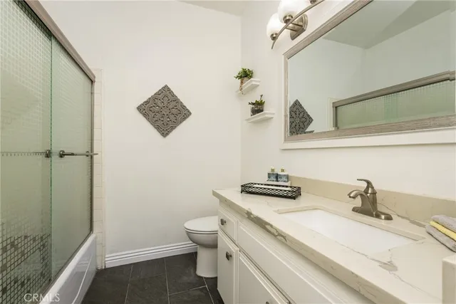 a close view of a sink and a toilet