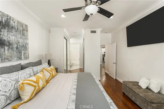 a bathroom with a sink and a glass door shower