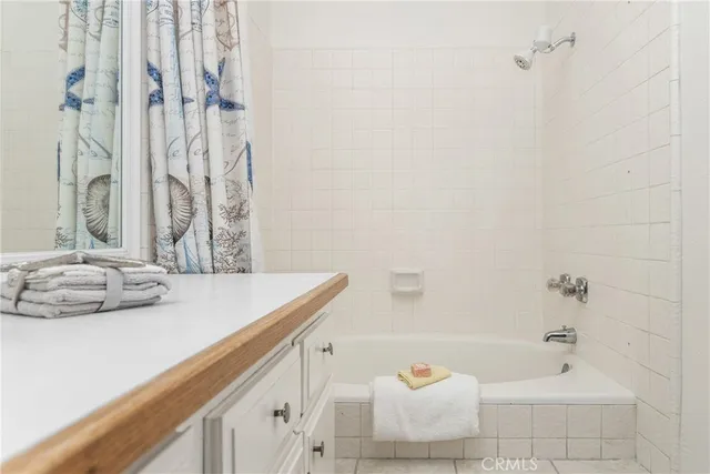 a backyard of a house with a tree