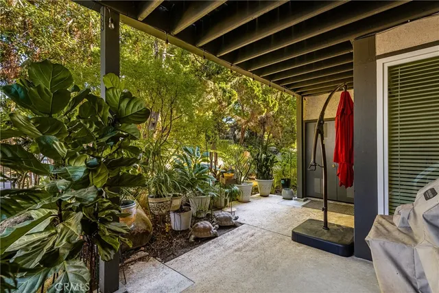 a backyard of a house with seating space