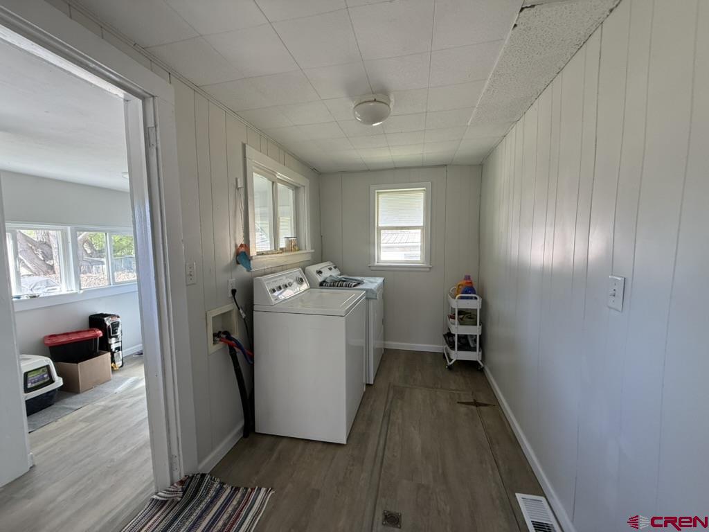 210 Southwest 6th Street Cedaredge, CO 81413 - Photo 13 of 16 a room that has a couch and a chair in it