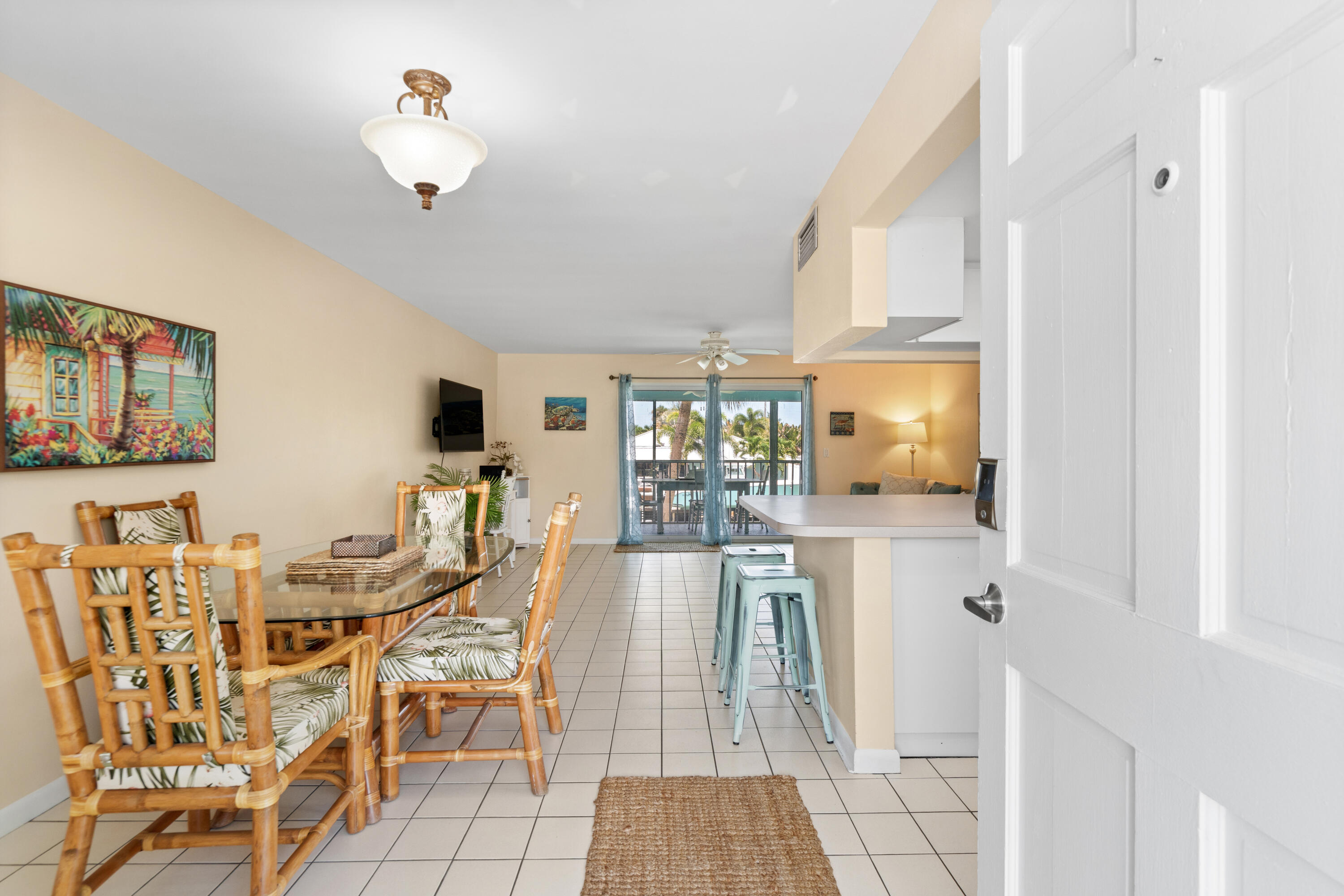 249 Center Street, Unit 2C Jupiter, FL 33458 - Photo 6 of 29 a view of a dining room with furniture