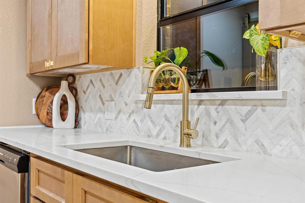 2214 Rex Cruse Drive Sherman, TX 75092 - Photo 20 of 40 a close view of sink and tap