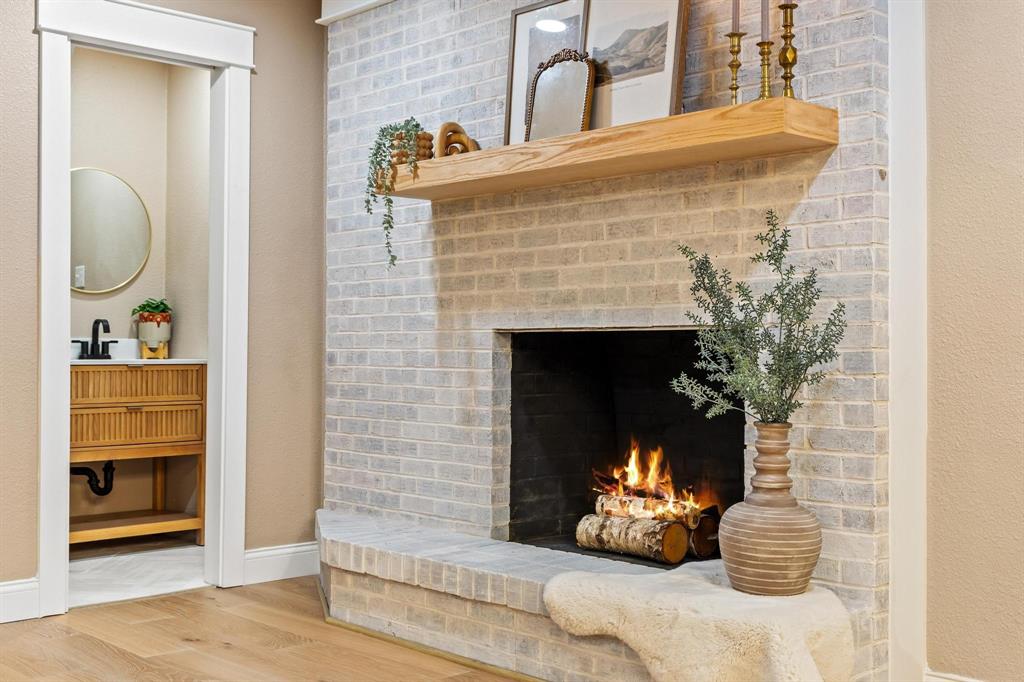 2214 Rex Cruse Drive Sherman, TX 75092 - Photo 7 of 40 a living room with furniture and a fireplace