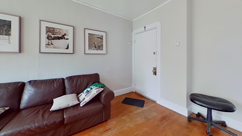 32 Gordon Street, Unit 3 Boston, MA 02134 - Photo 2 of 5 a living room with furniture and a couch