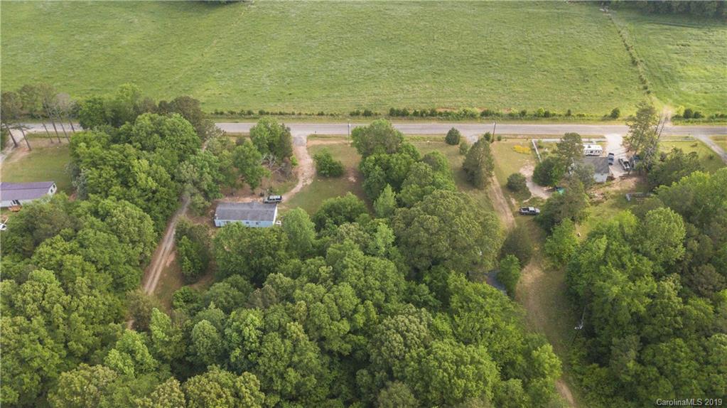 1898 Canal Road Catawba, SC 29704 - Photo 15 of 24 an aerial view of residential houses with outdoor space and trees