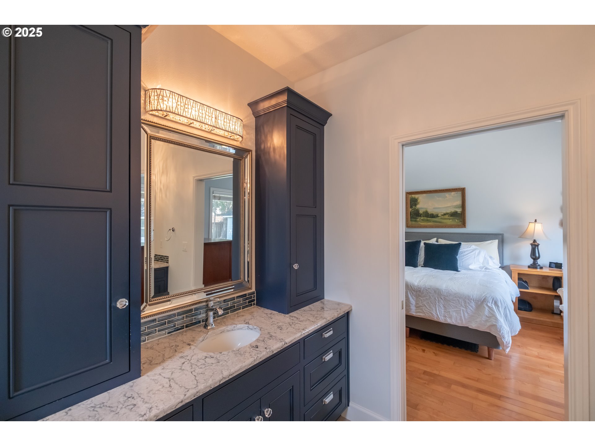 1435 Northwest Ashley Drive Albany, OR 97321 - Photo 25 of 44 a en suite bathroom with a granite countertop sink and a mirror