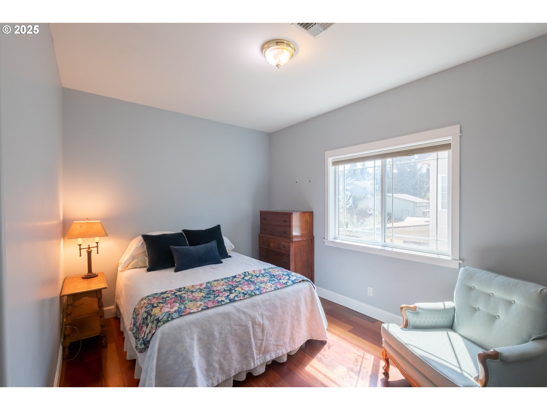 1435 Northwest Ashley Drive Albany, OR 97321 - Photo 29 of 44 a bedroom with a bed and window