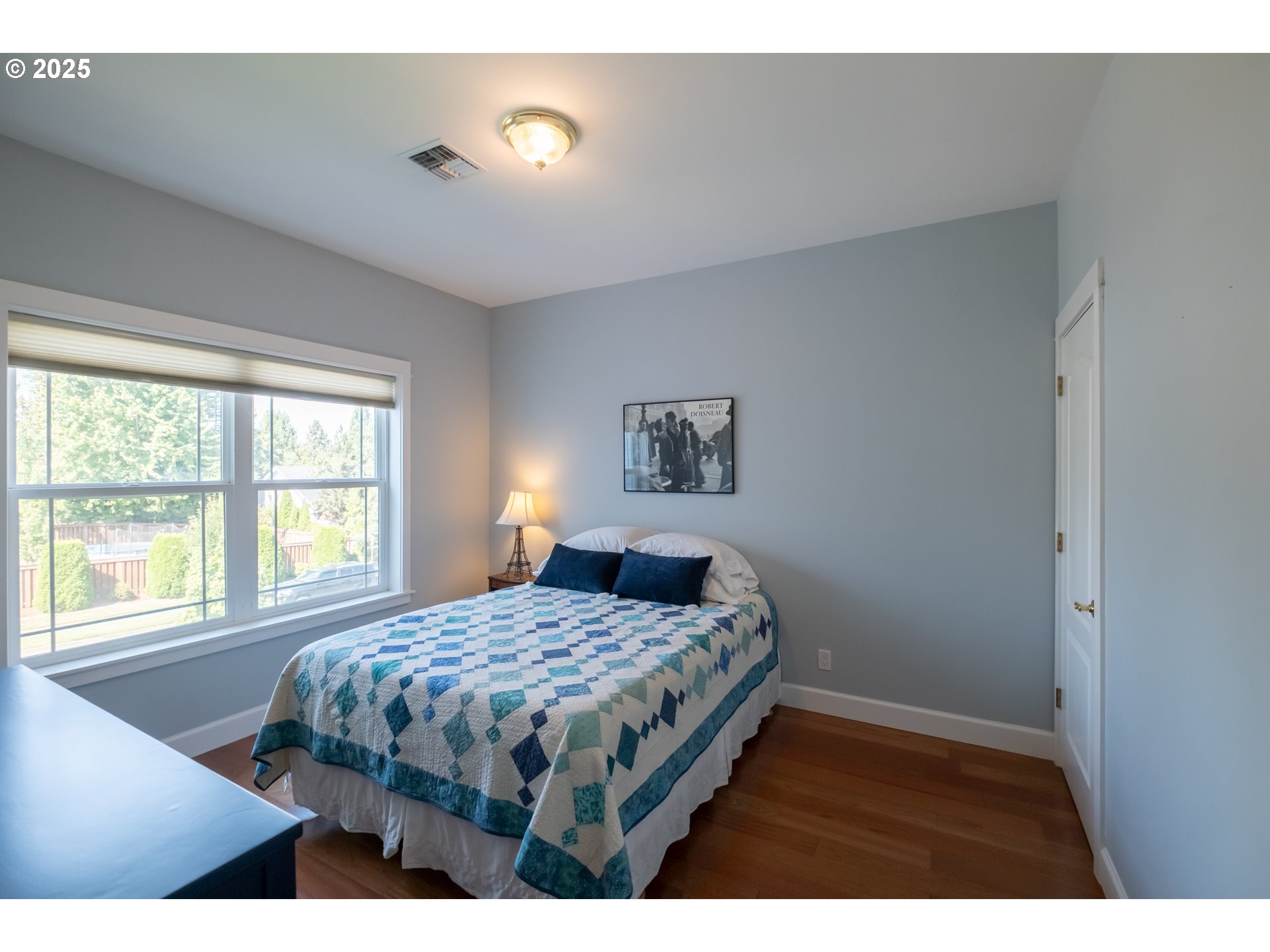 1435 Northwest Ashley Drive Albany, OR 97321 - Photo 30 of 44 a bedroom with a bed and a window