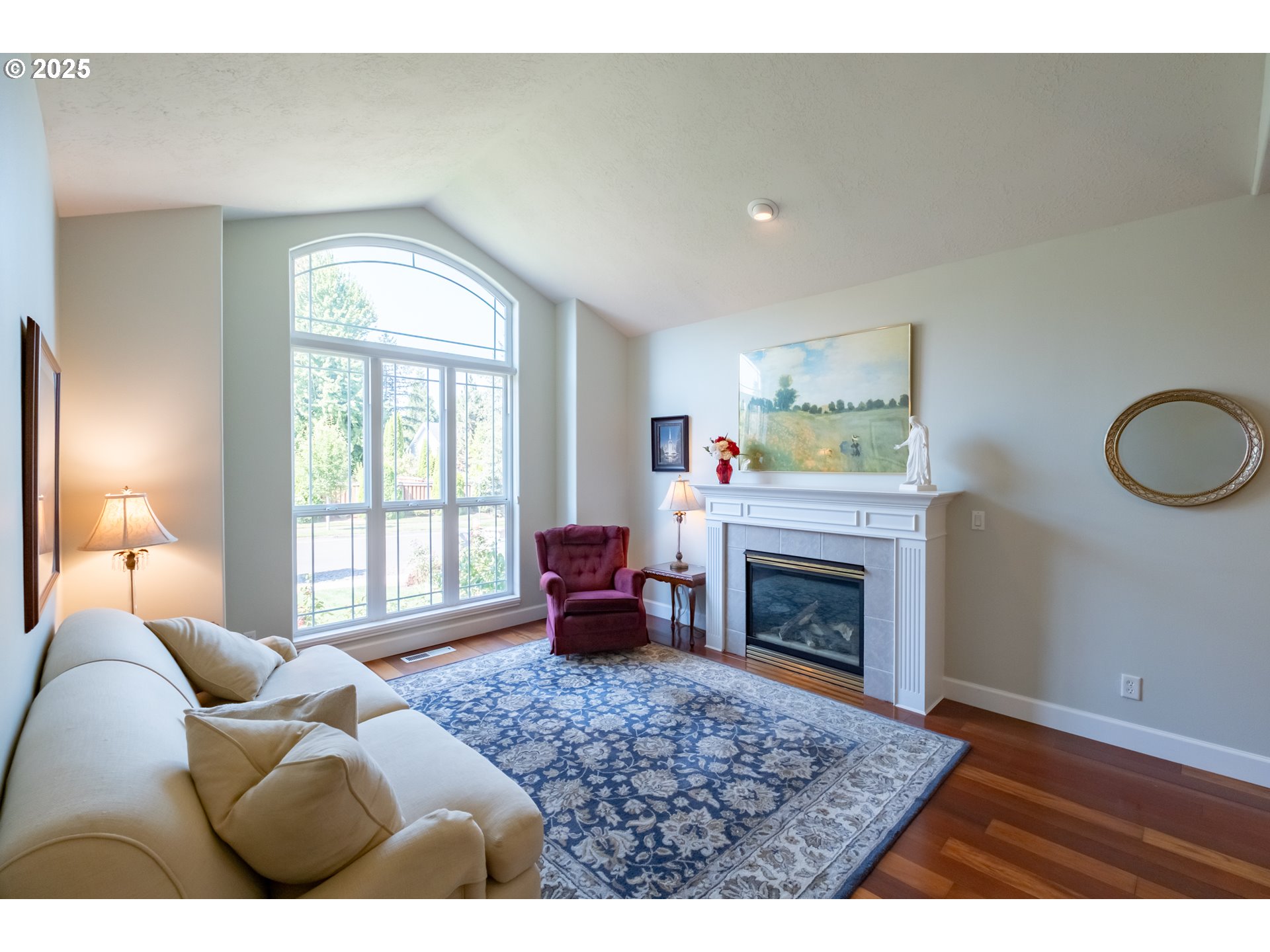 1435 Northwest Ashley Drive Albany, OR 97321 - Photo 5 of 44 a living room with furniture windows and a fireplace
