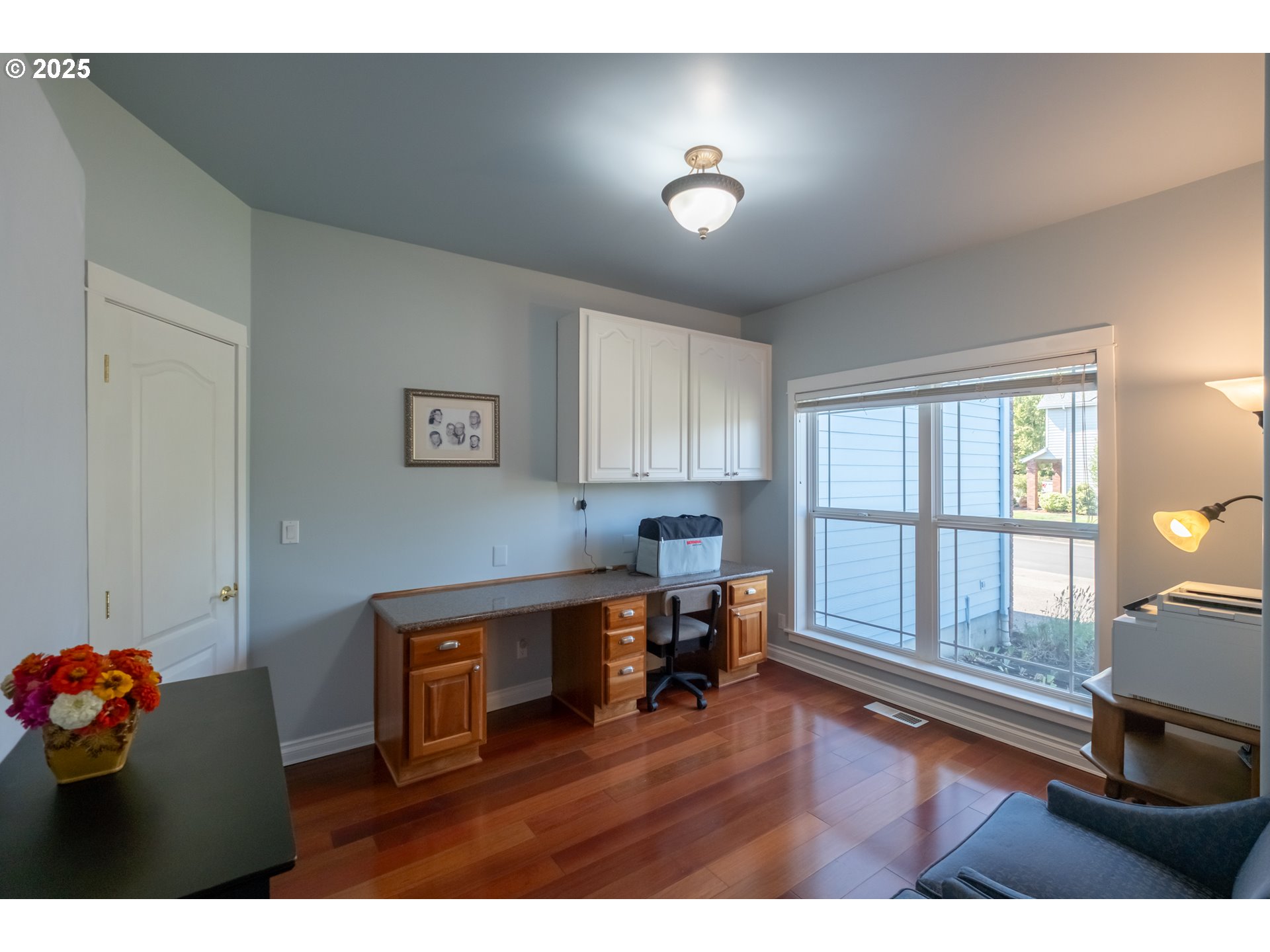 1435 Northwest Ashley Drive Albany, OR 97321 - Photo 9 of 44 a living room with furniture and a wooden floor