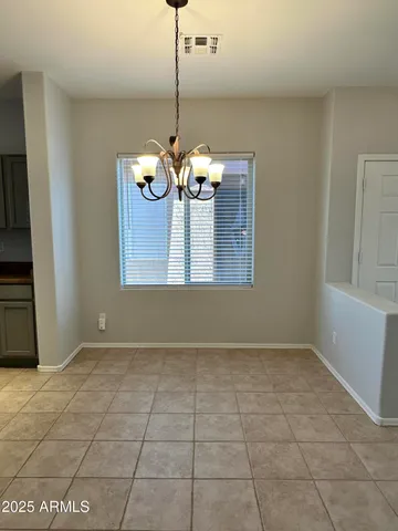 a view of a room with a chandelier