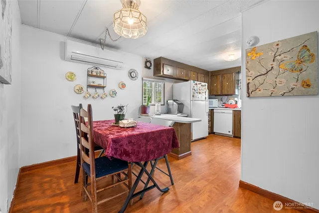 a view of a dining room with furniture