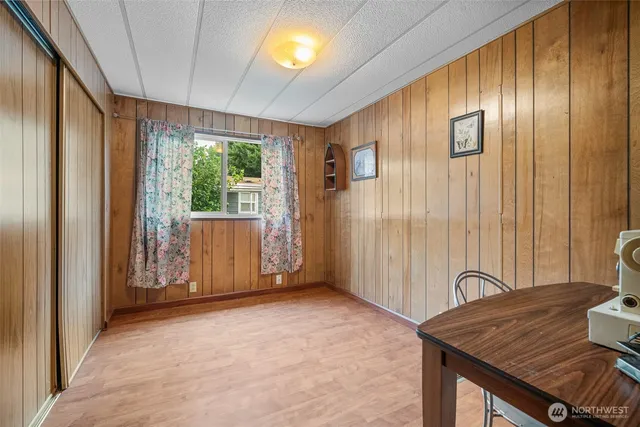 a view of a livingroom with furniture window and outside view