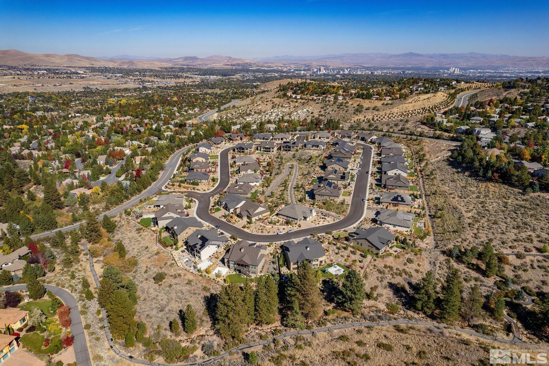 4104 Whispering Pine Loop Reno, NV 89519 - Photo 26 of 27 an aerial view of residential building with parking space