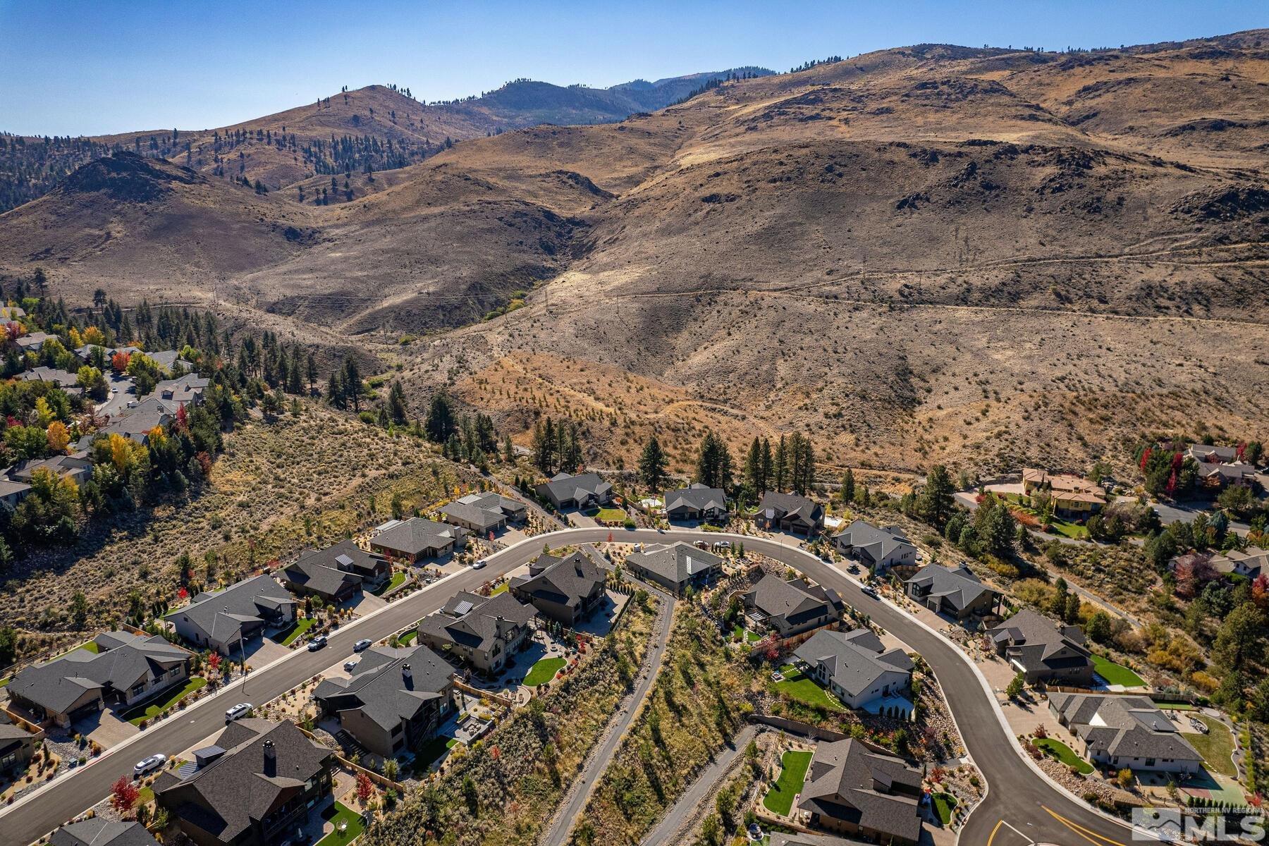 4104 Whispering Pine Loop Reno, NV 89519 - Photo 27 of 27 an aerial view of multiple house