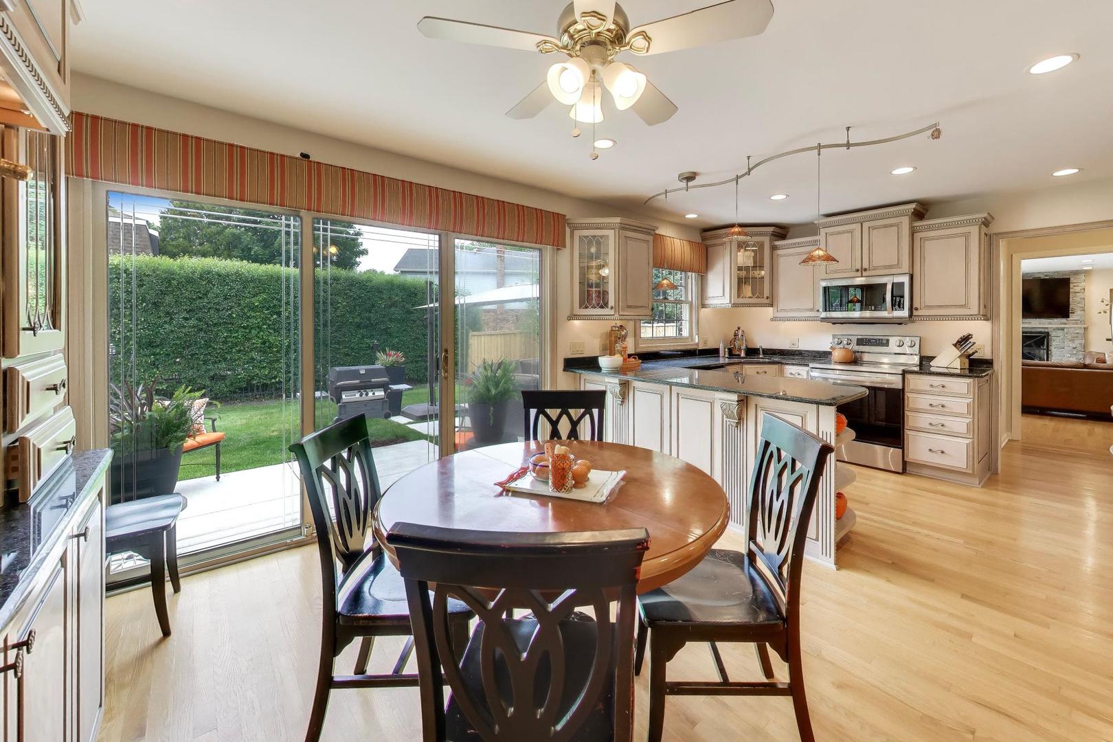 3956 Rutgers Lane Northbrook, IL 60062 - Photo 8 of 41 a view of a dining room with furniture window and outside view