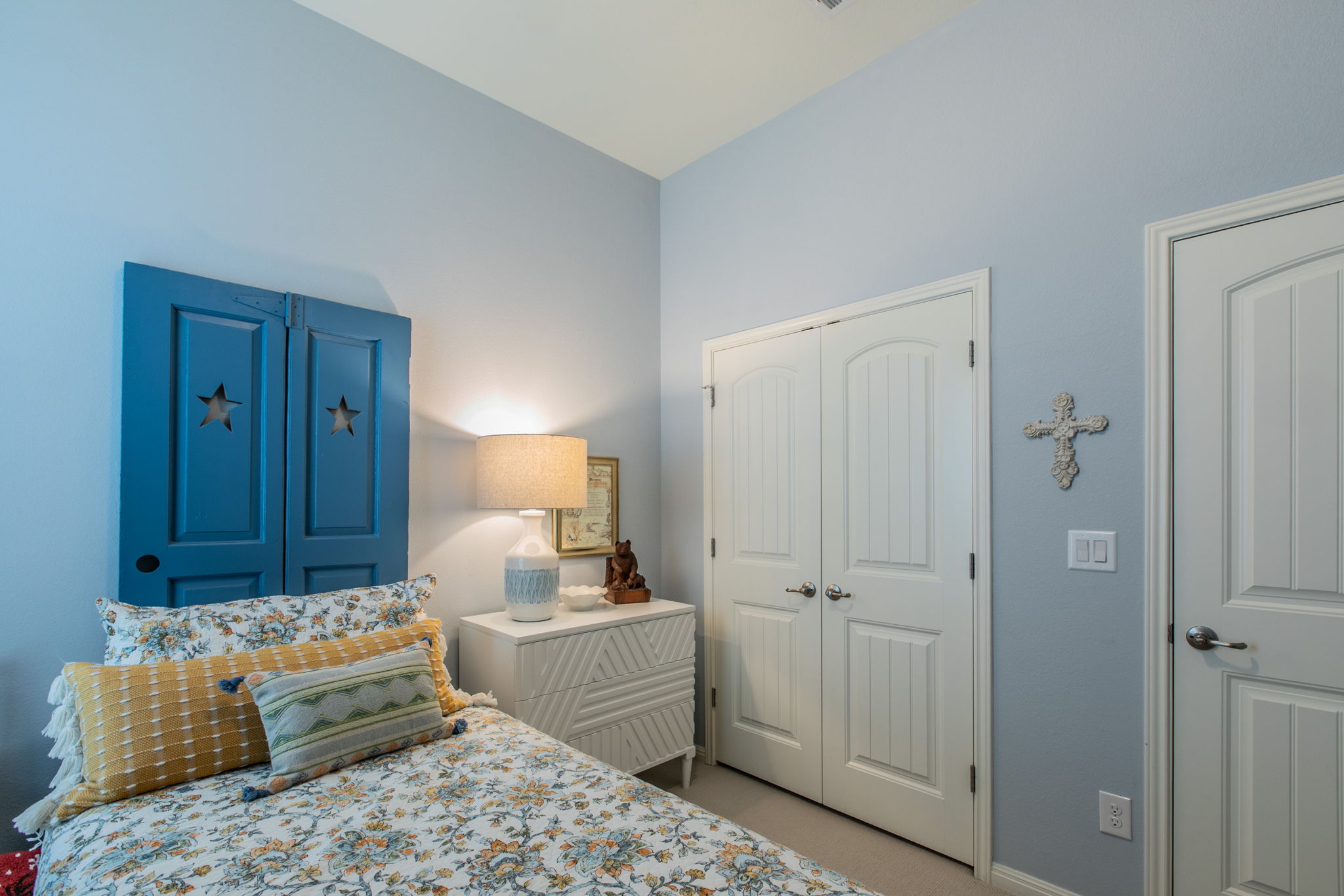 231 Simon Kyle, TX 78640 - Photo 18 of 29 Neutral-toned carpeting complements the light blue wall paint