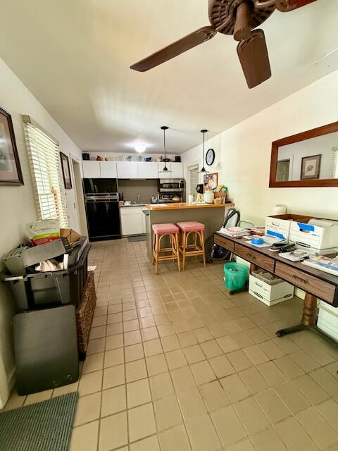 709 Frances Street Key West, FL 33040 - Photo 3 of 6 a living room with lots of furniture and kitchen view