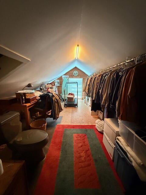 709 Frances Street Key West, FL 33040 - Photo 4 of 6 a view of walk in closet with clothes and shoes