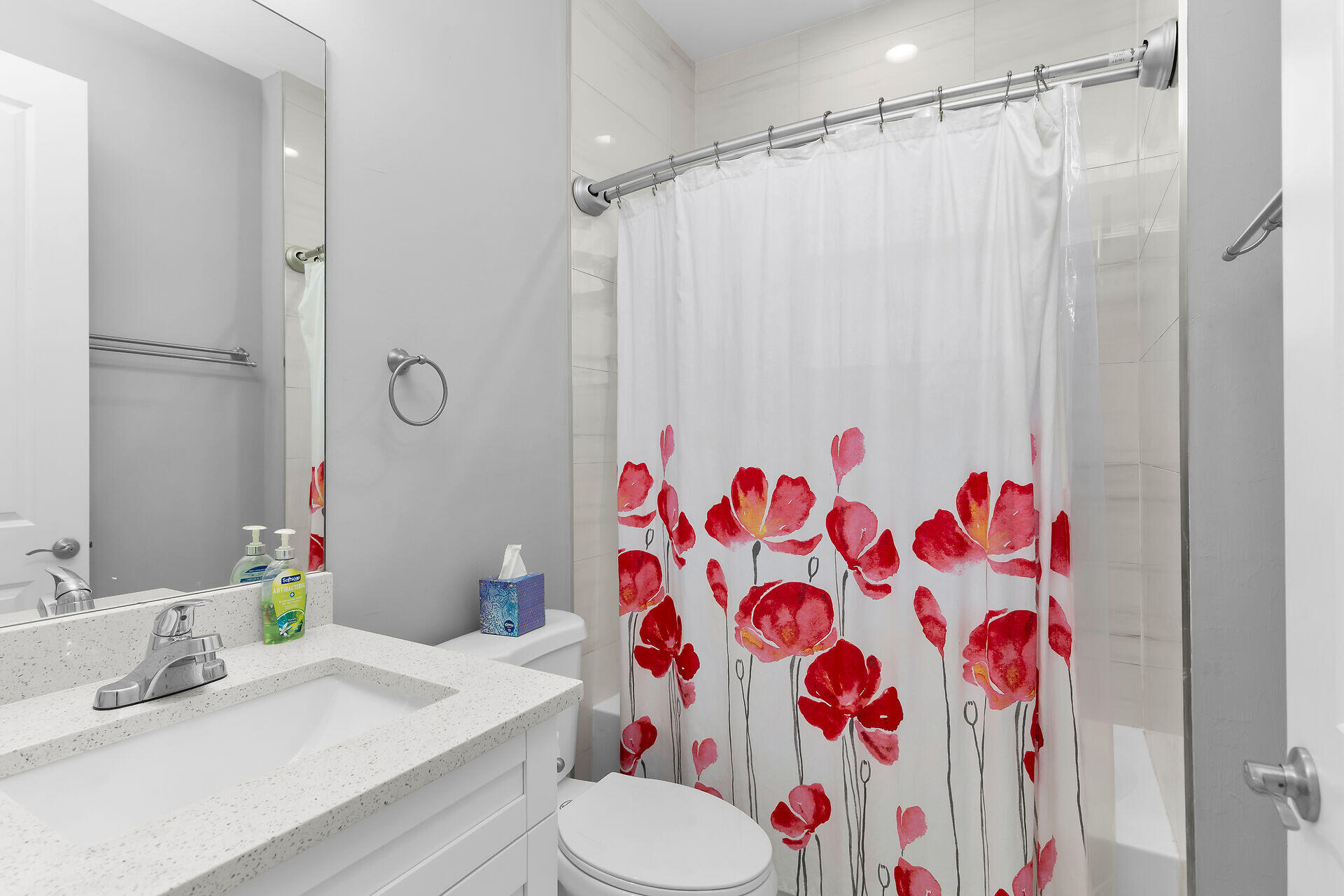 3625 54th Avenue Northeast Naples, FL 34120 - Photo 18 of 40 a bathroom with a sink toilet and shower