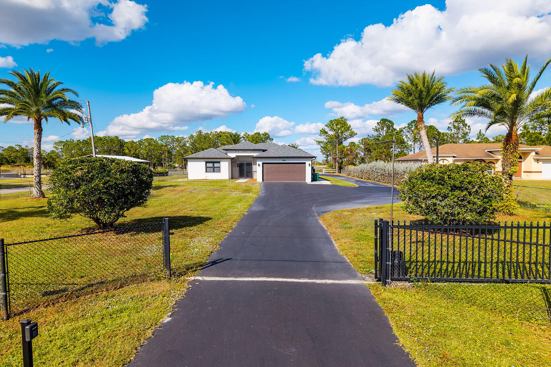 3625 54th Avenue Northeast Naples, FL 34120 - Photo 3 of 40 electric gate