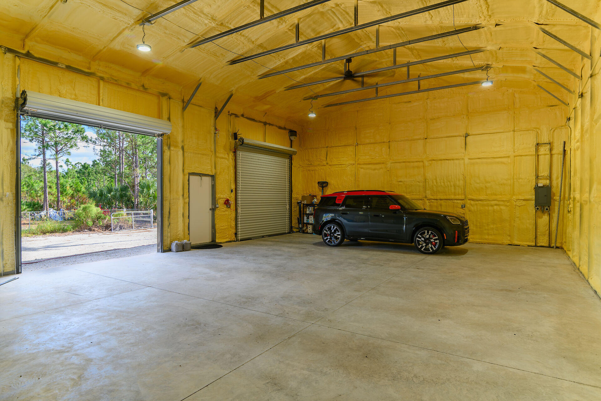 3625 54th Avenue Northeast Naples, FL 34120 - Photo 33 of 40 a view of a car garage