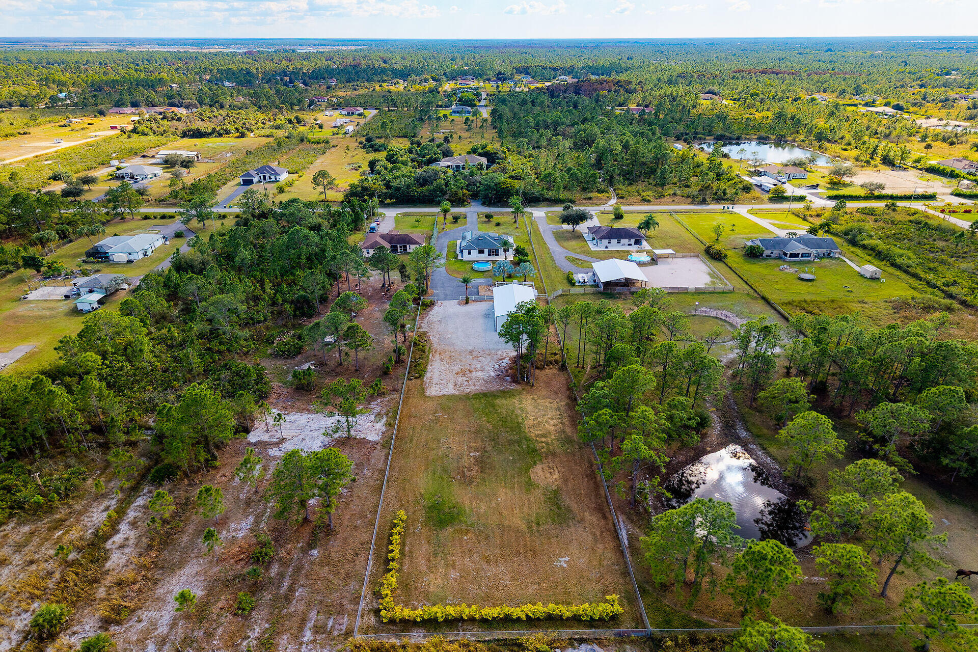 3625 54th Avenue Northeast Naples, FL 34120 - Photo 40 of 40 an aerial view of residential houses with outdoor space