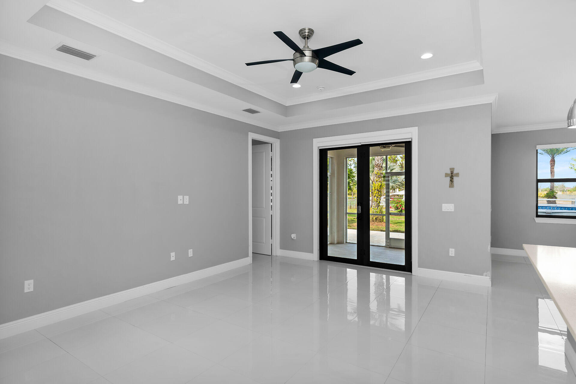 3625 54th Avenue Northeast Naples, FL 34120 - Photo 5 of 40 a view of an empty room with a window