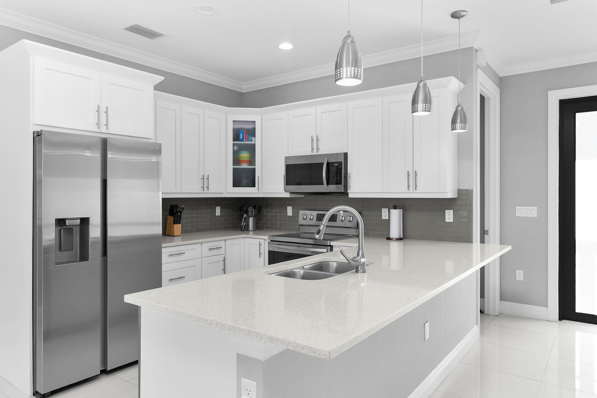 3625 54th Avenue Northeast Naples, FL 34120 - Photo 9 of 40 kitchen/breakfast bar