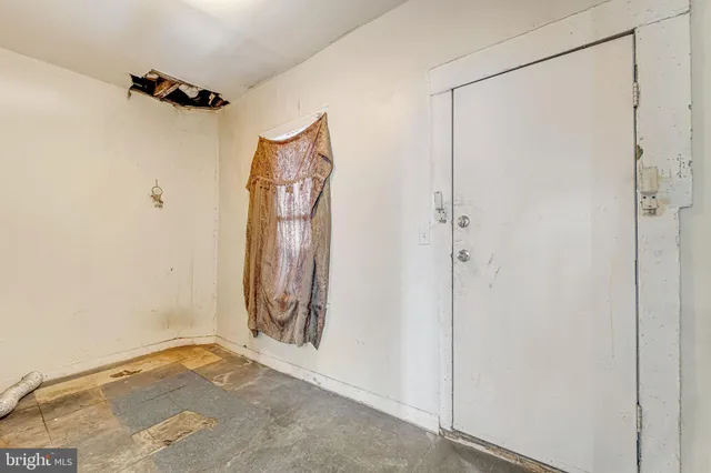 a view of a bathroom with a shower and a sink