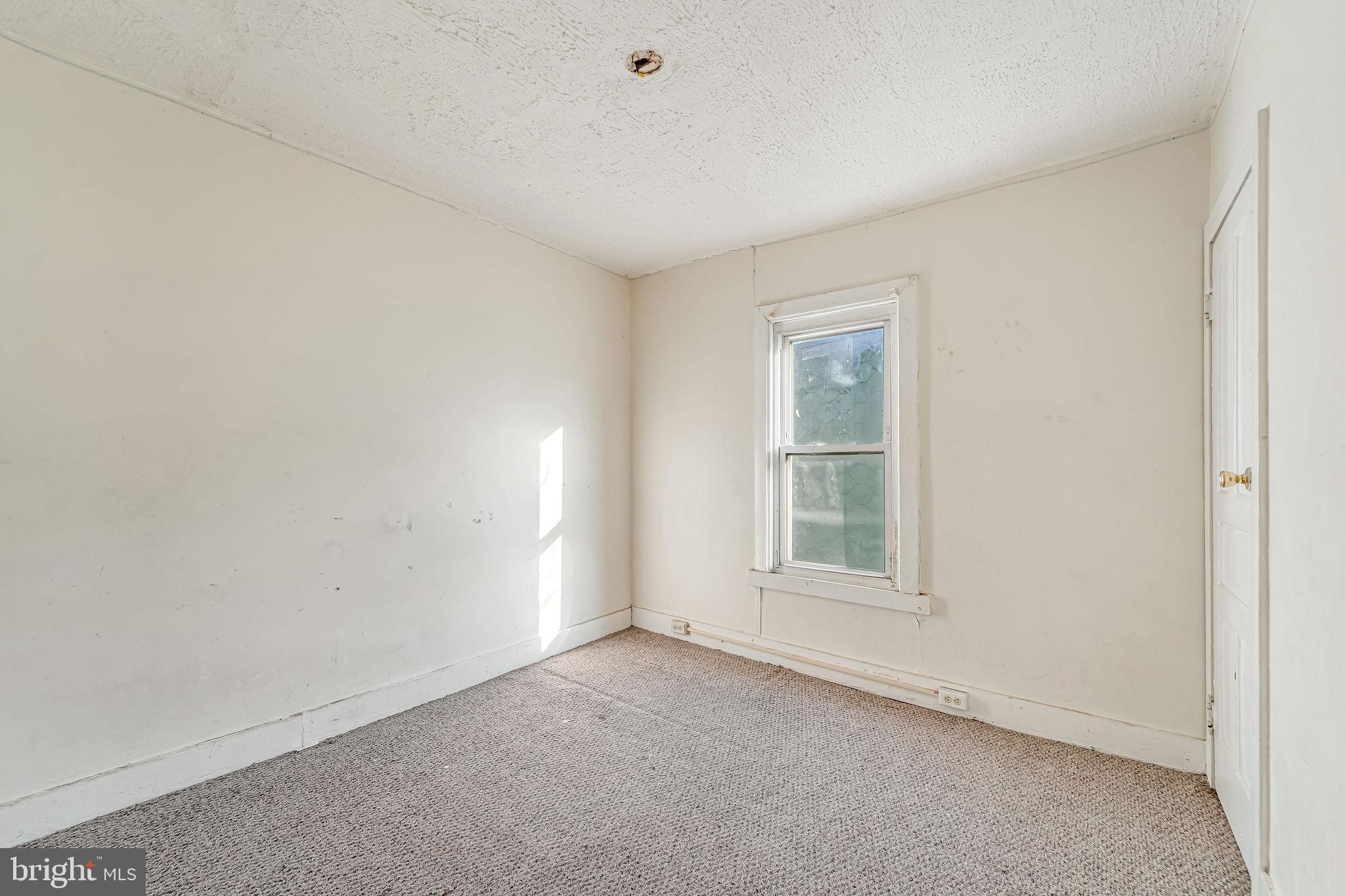 112 North 23rd Street Camden, NJ 08105 - Photo 12 of 23 an empty room with a window