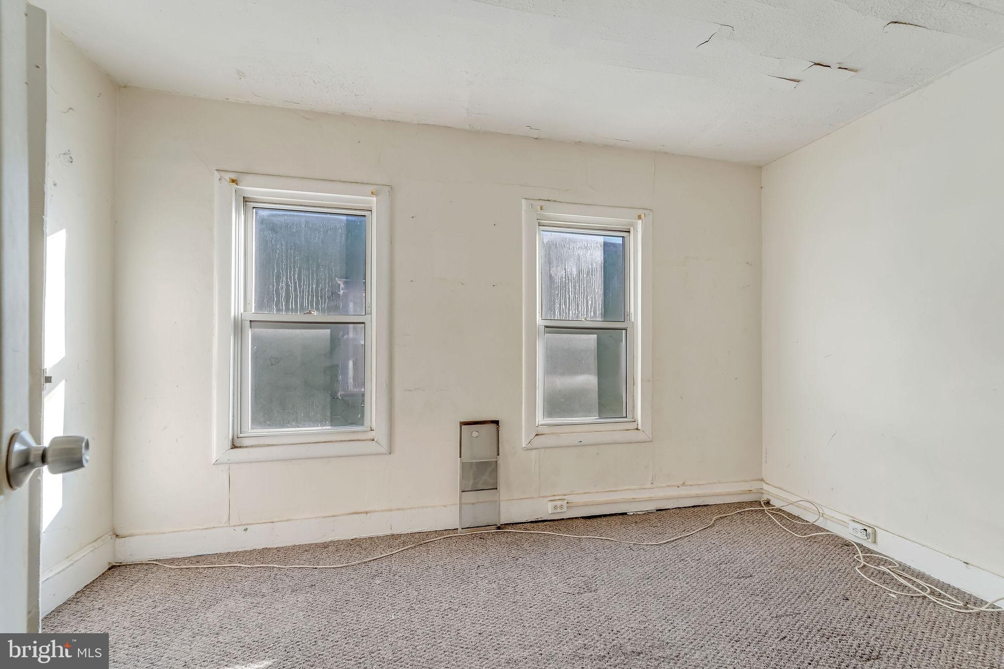 112 North 23rd Street Camden, NJ 08105 - Photo 15 of 23 an empty room with windows