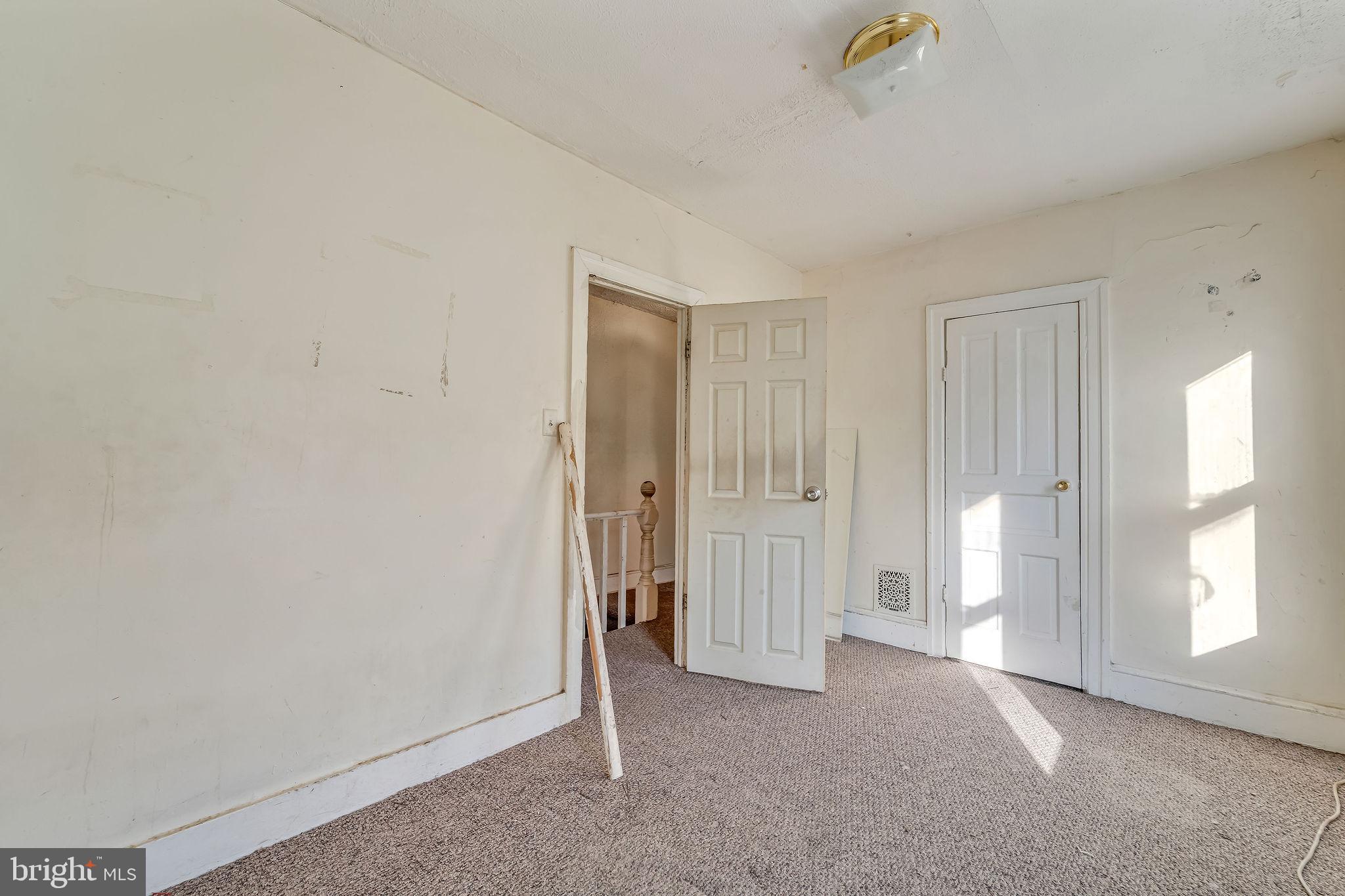 112 North 23rd Street Camden, NJ 08105 - Photo 16 of 23 a view of an empty room with a window