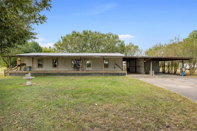 a living room with furniture a fireplace and furniture